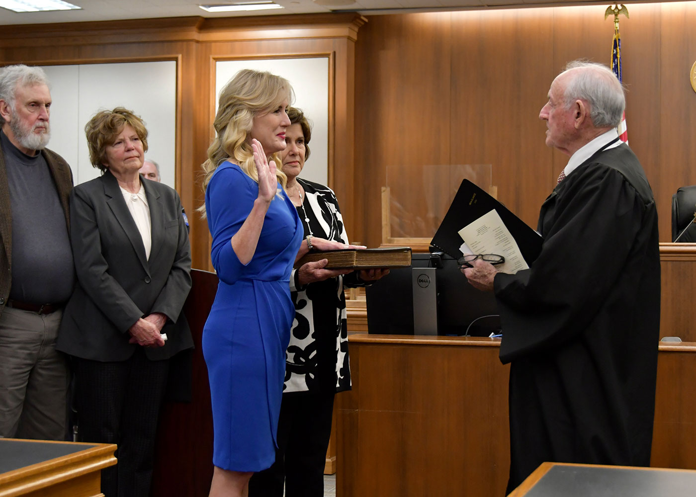 The Honorable Donald M. Fendelson swearing in Tara Zeller as District Judge (Section B), of the 22nd Judicial District.