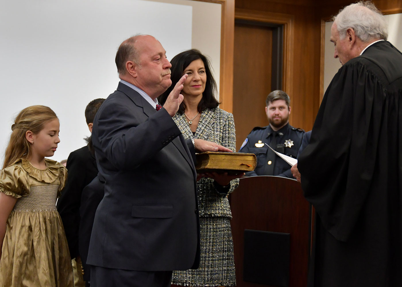 Alan Black being sworn in as District Judge (Section A) of the 22nd Judicial District, by the Honorable Martin E. Coady.
